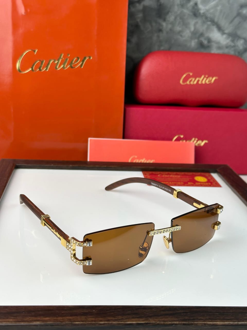 Cartier Luxury Rimless Sunglasses | Gold & Crystal Detailing